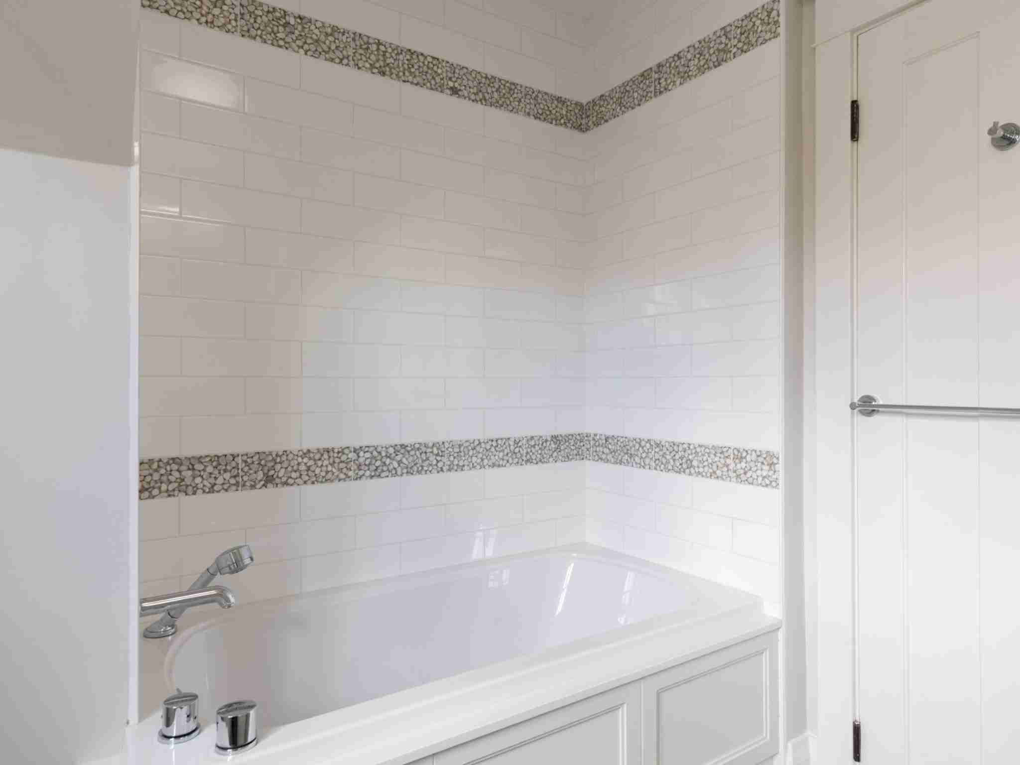 bedrooms bathroom large white tub.