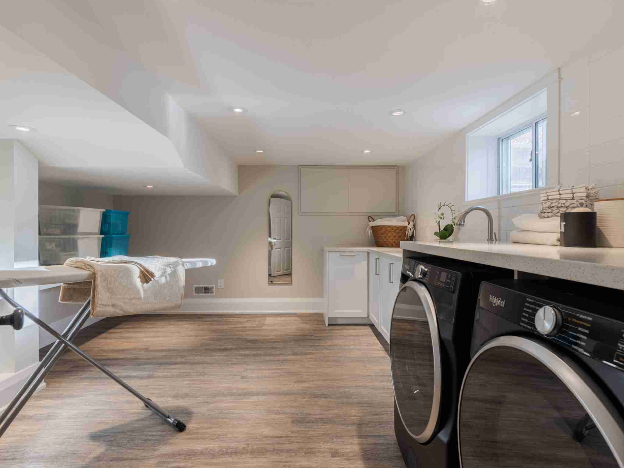 large basement laundry room/storage room