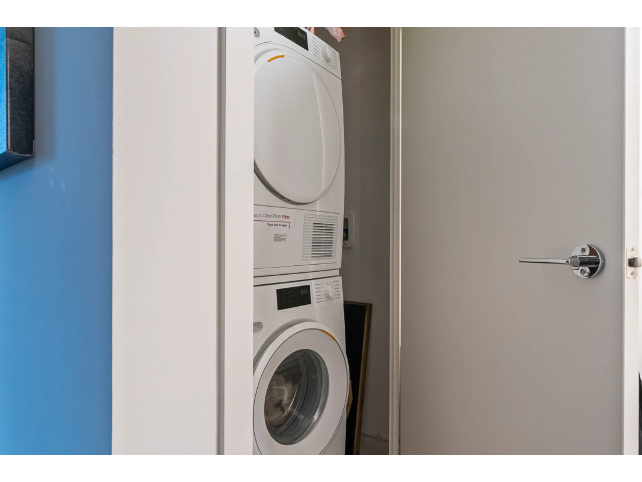Laundry closet with stacked washer/dryer