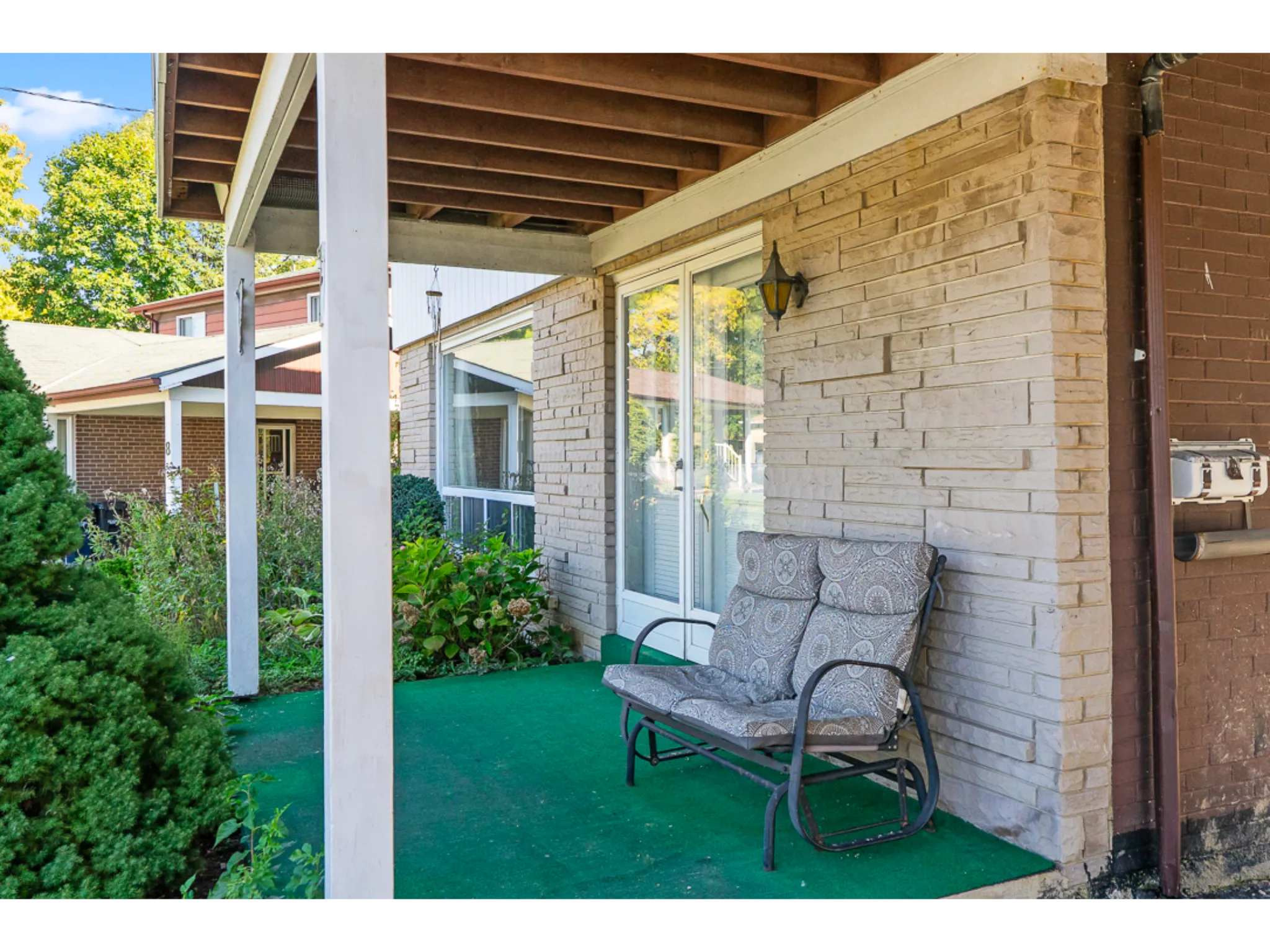 exterior covered front porch with awning