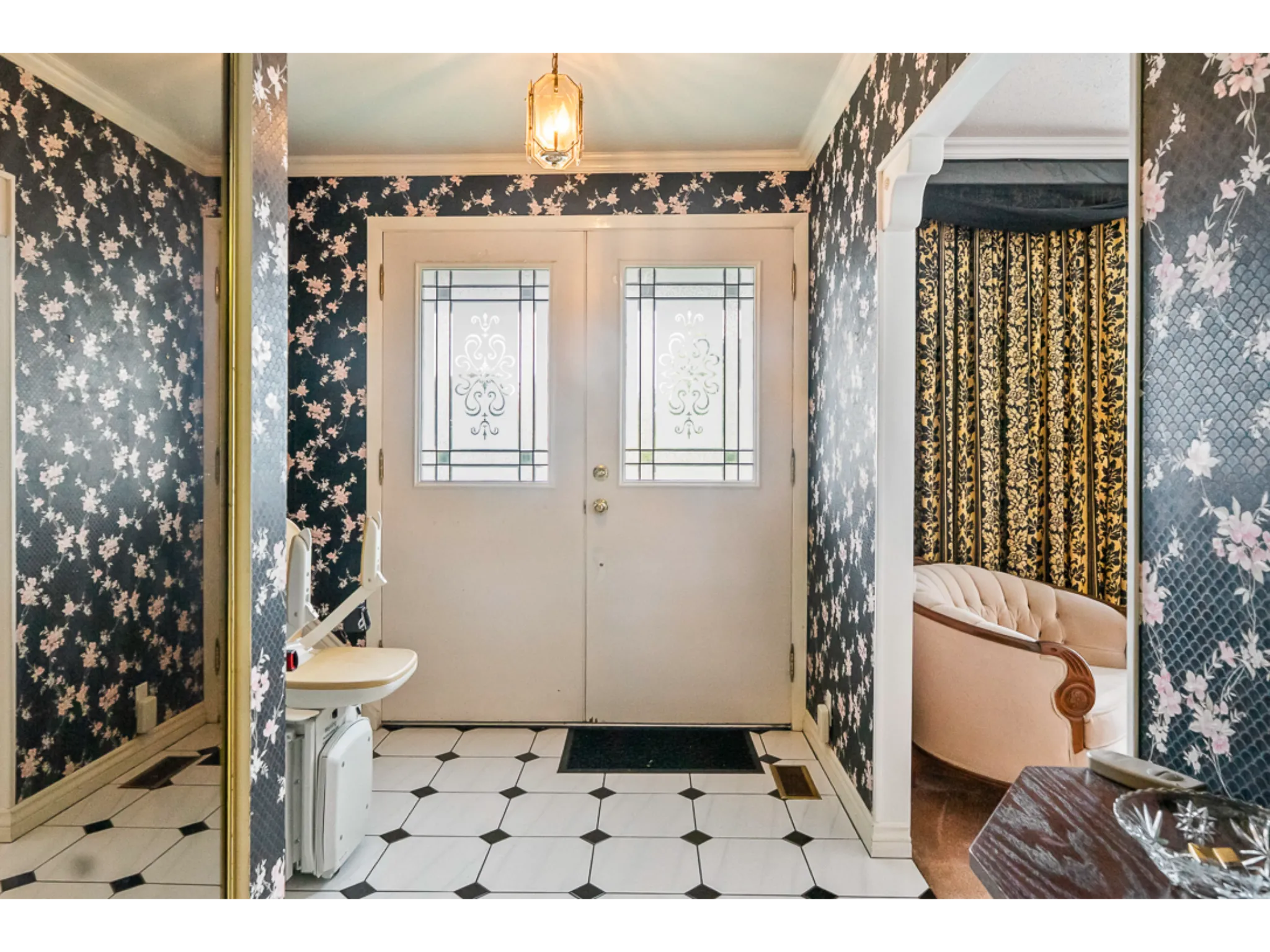 interior foyer with double doors and tile floor