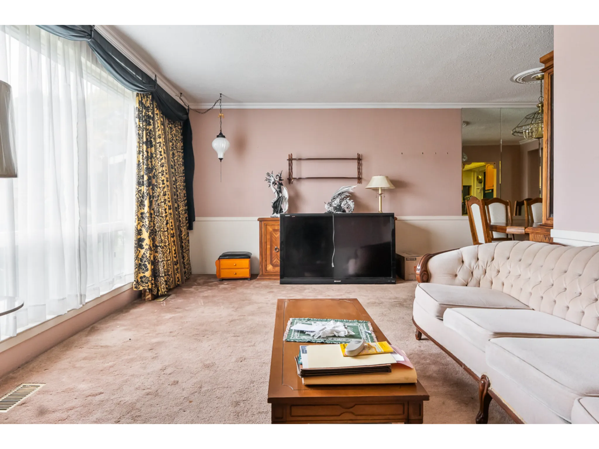open concept living room with bay window