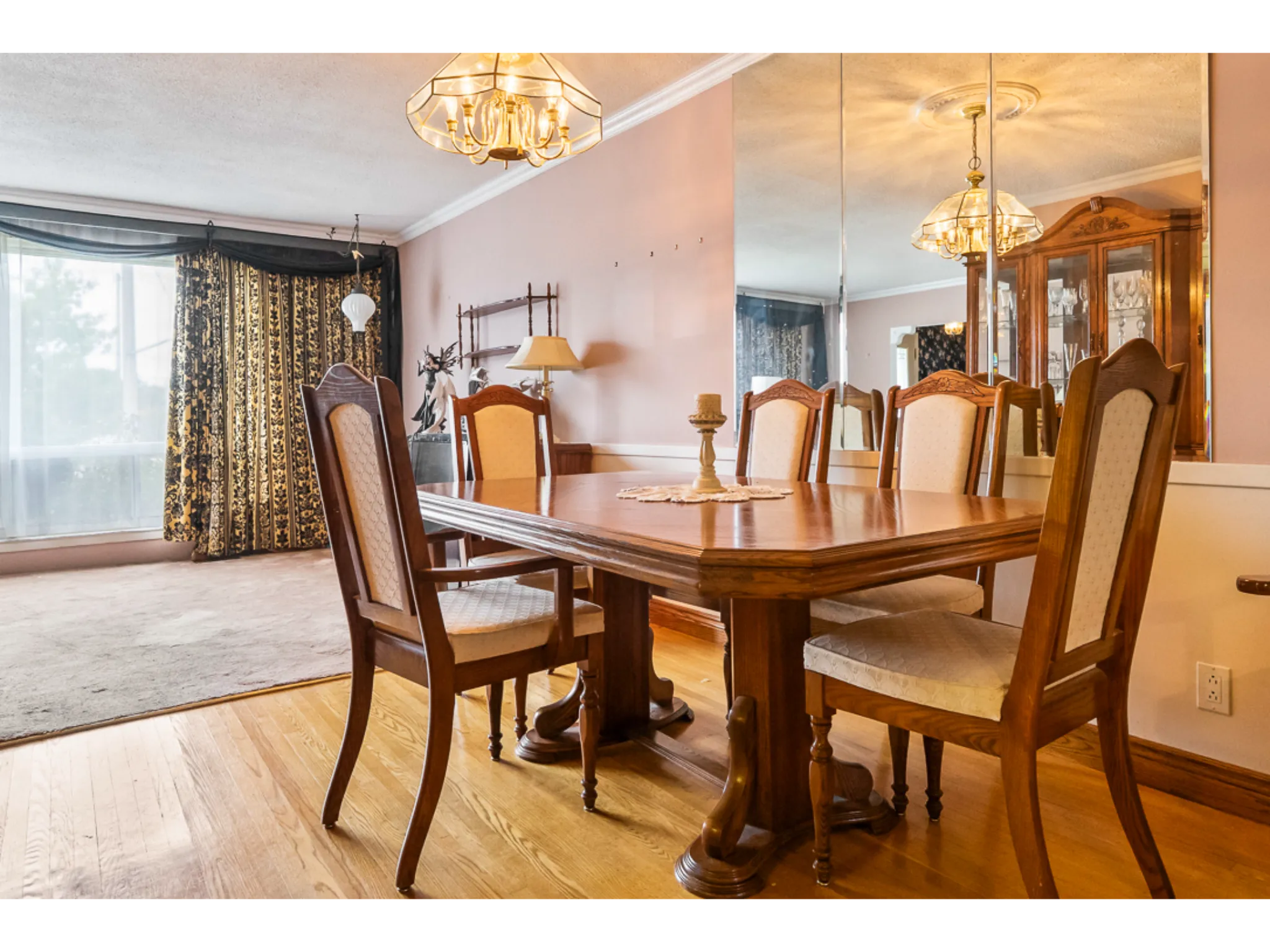 dining room with large mirrors