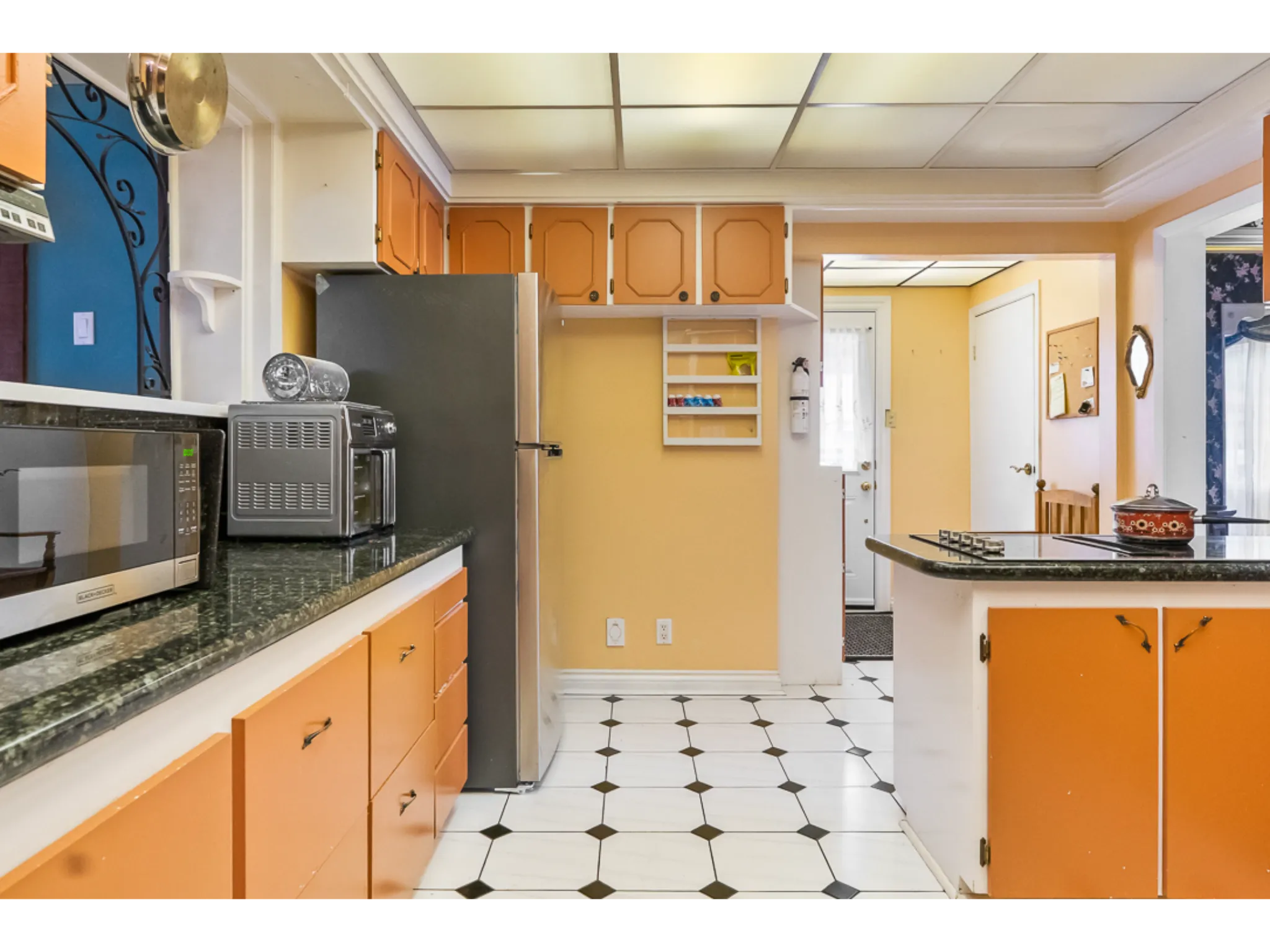 kitchen with tile floor and stainless steel applainces