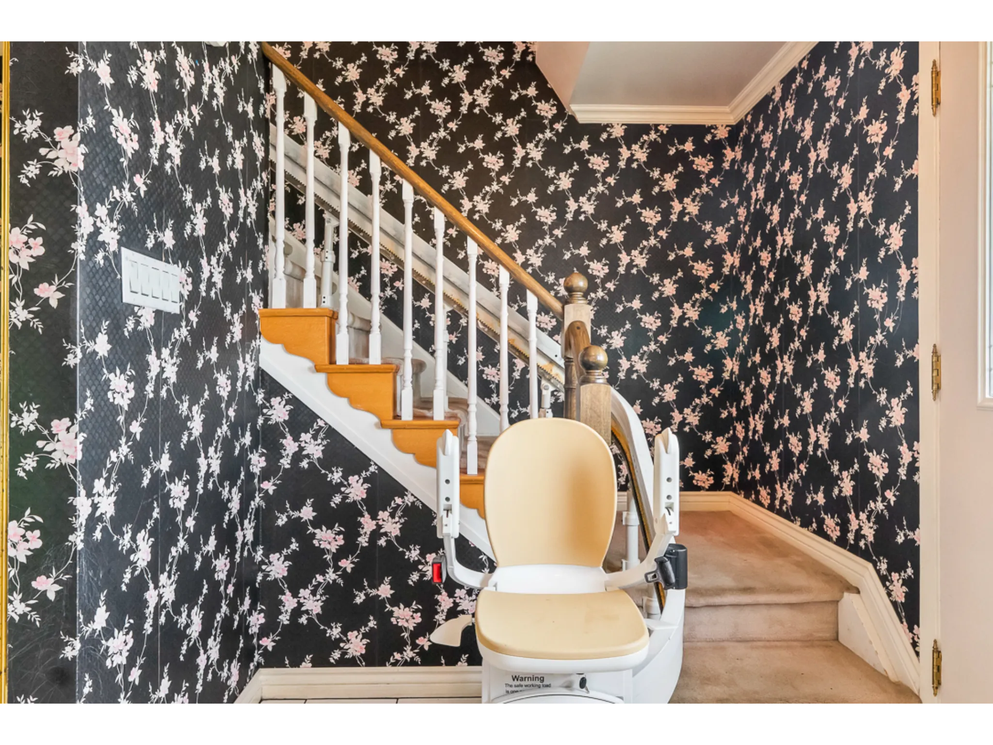 main floor stairs leading to upper level, white spindals