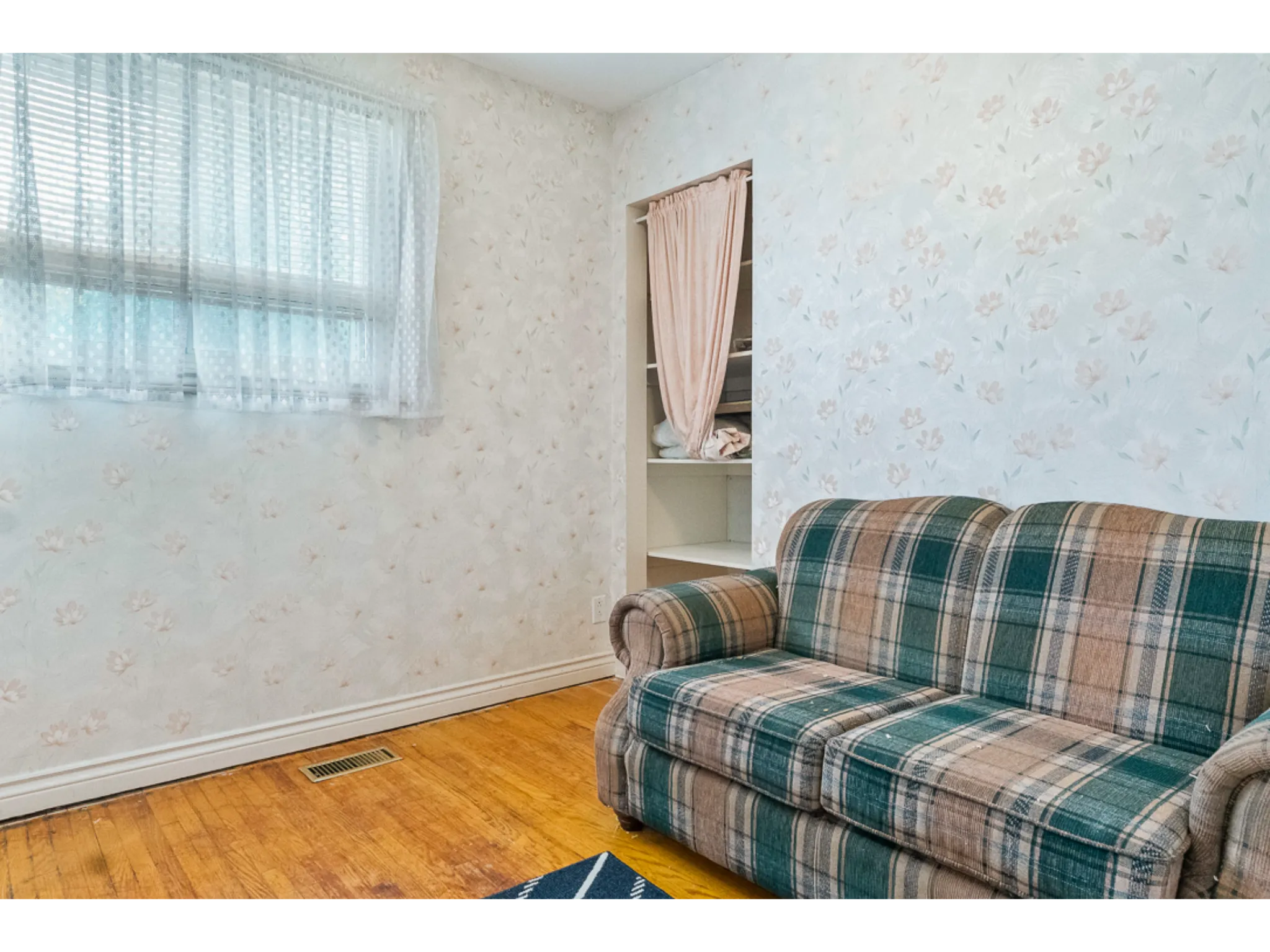 Bedroom 3/office with light hardwood flooring