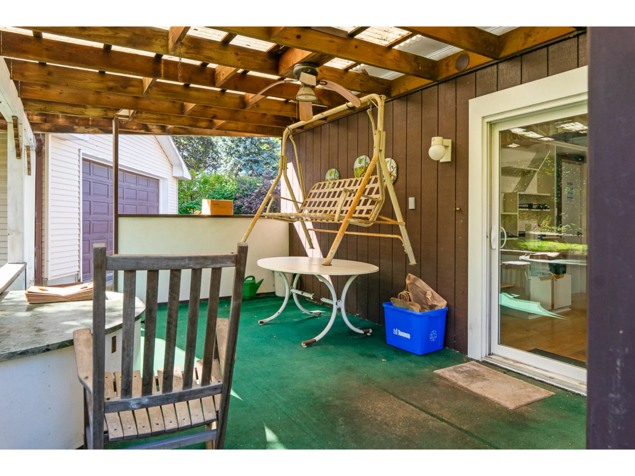 Covered back yard porch with seating
