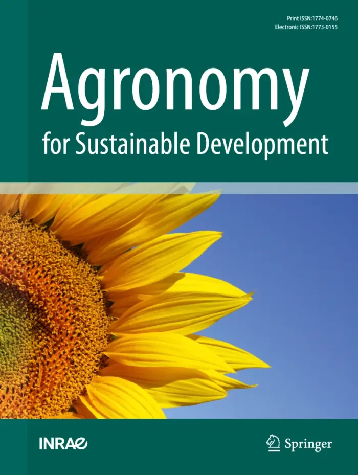 Cover of textbook, featuring cropped image of a sunflower and title text. Title text reads Agronomy for Sustainable Development