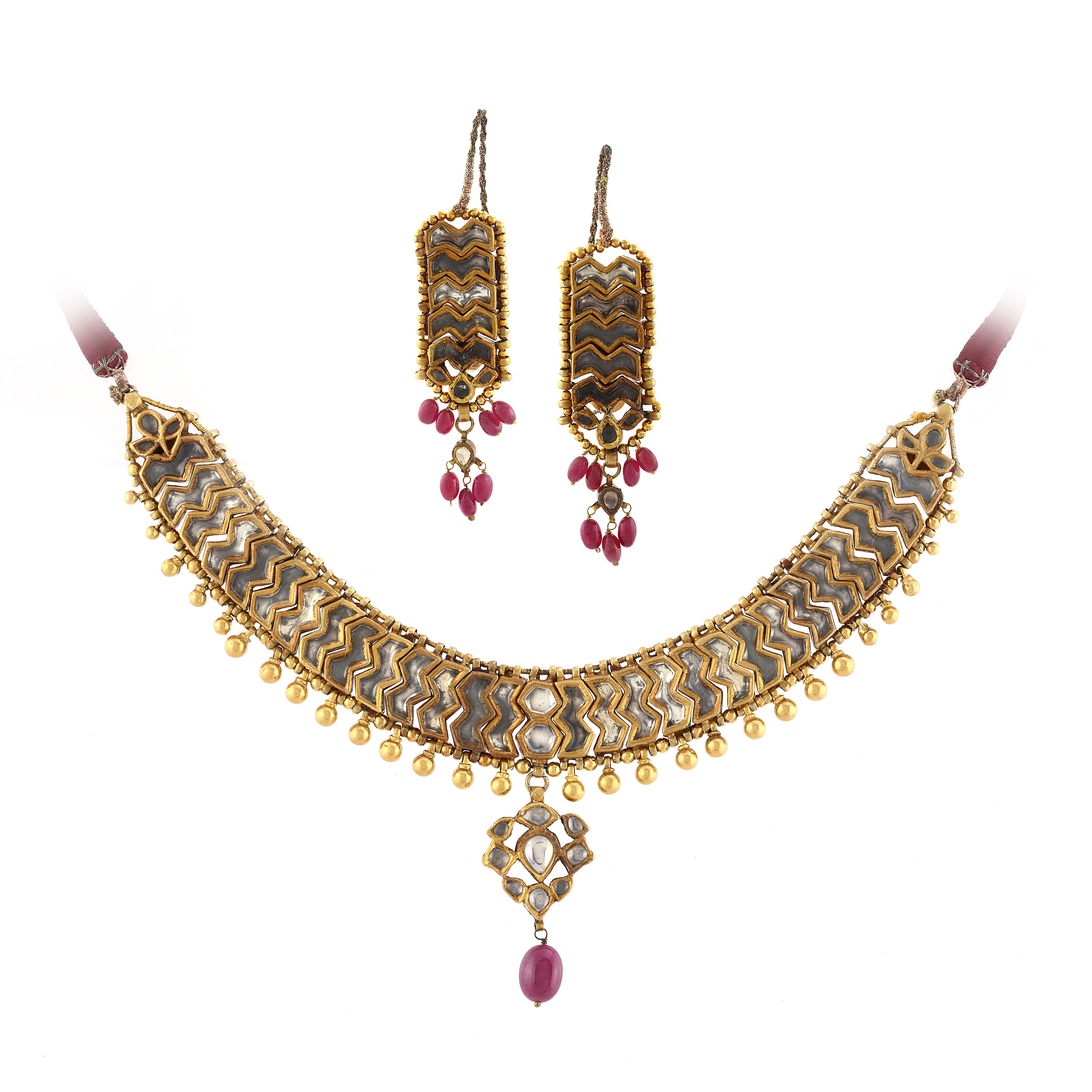 Piece Details Saffronart A SUITE OF GEMSET JEWELRY