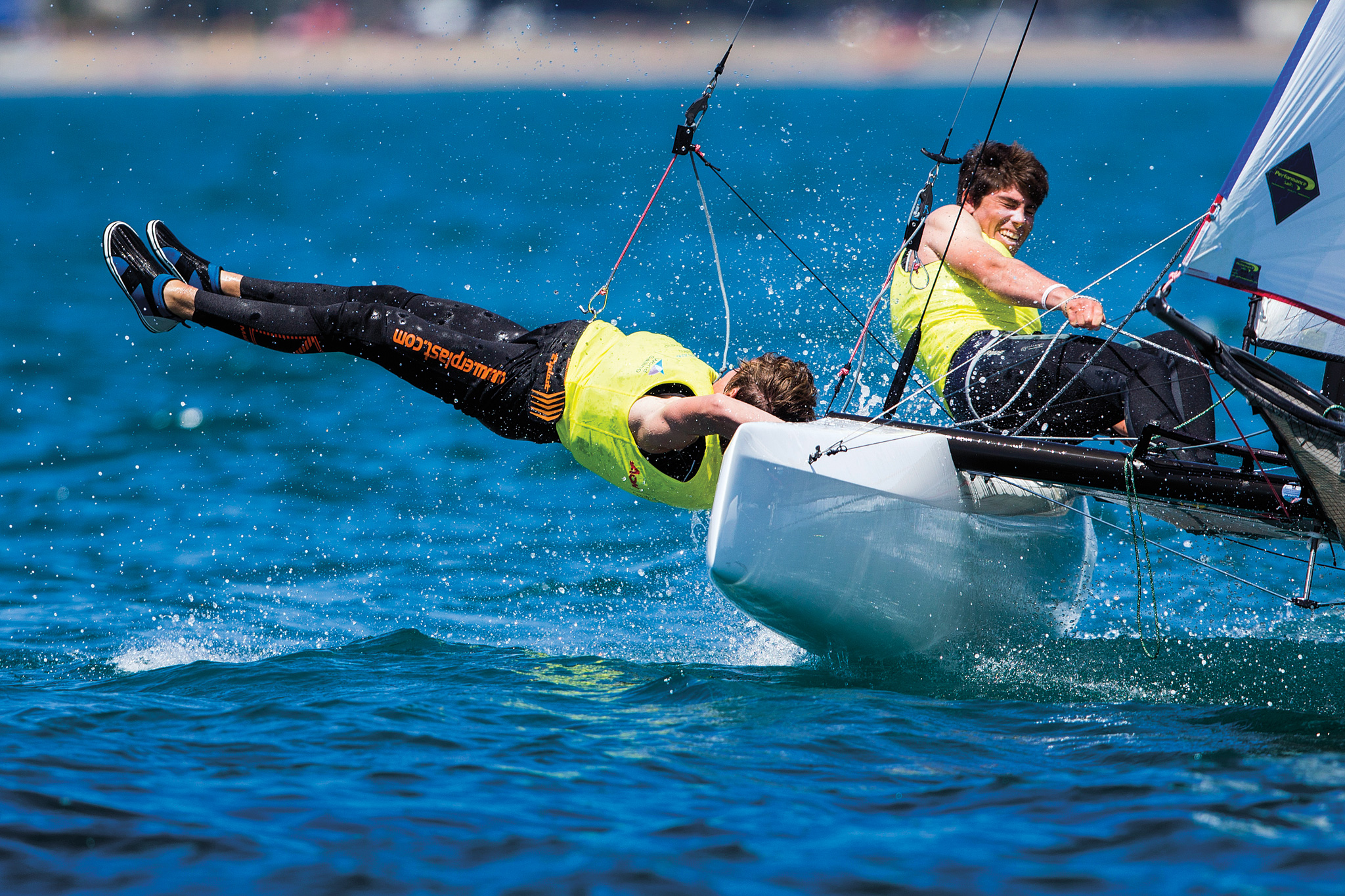 Trying out a new trapezing style at the Sailing World Championships in Auckland, New Zealand