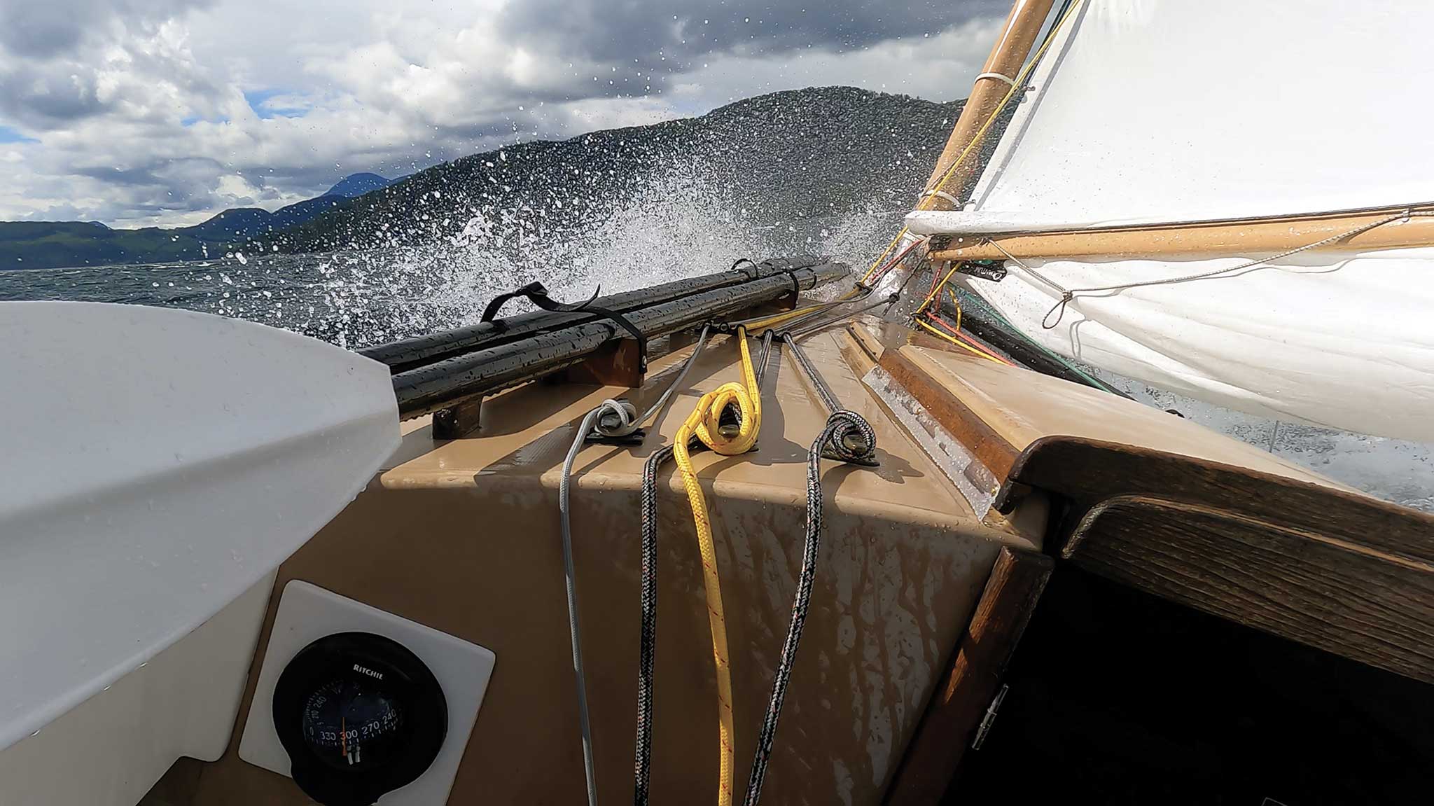 A reefed down Wildcat bashes to weather in Johnstone Strait. Photo courtesy Adam Cove