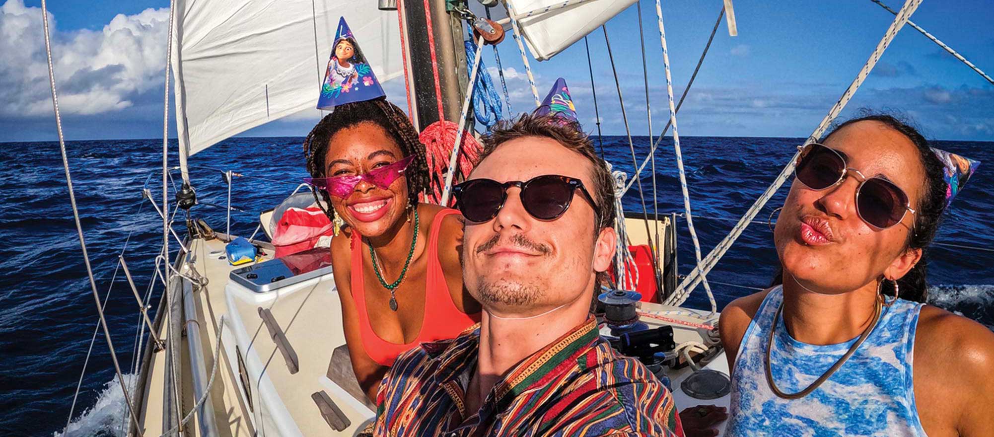 Alex Thompson, Max, and Chloë Peglau celebrate crossing the equator. Photo Courtesy of Max Campbell