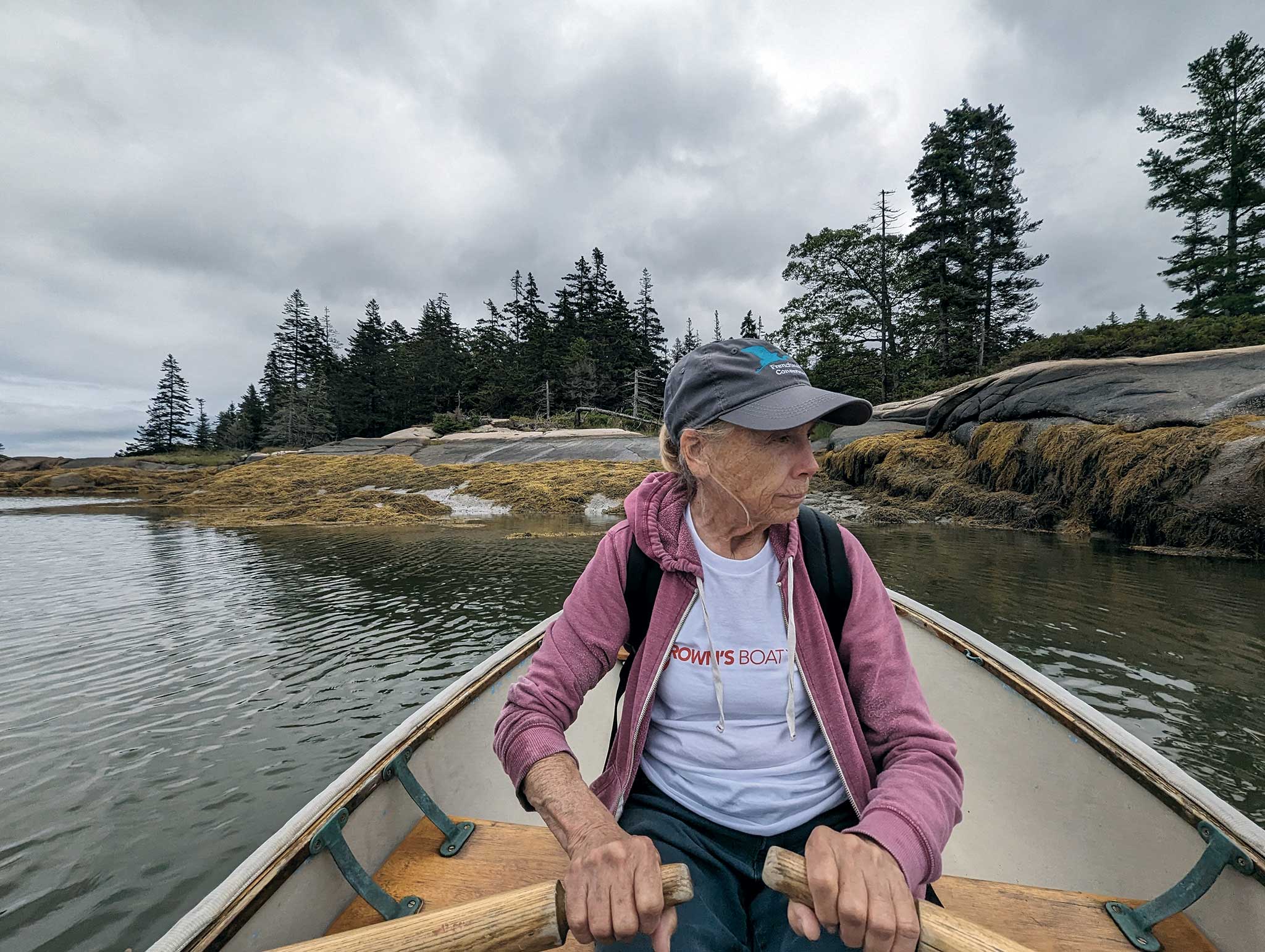 Ann rows Mighty Mite, the dinghy that provided transportation from the mother ship to all hiking and walking trails. Photo by Ann Hoffner