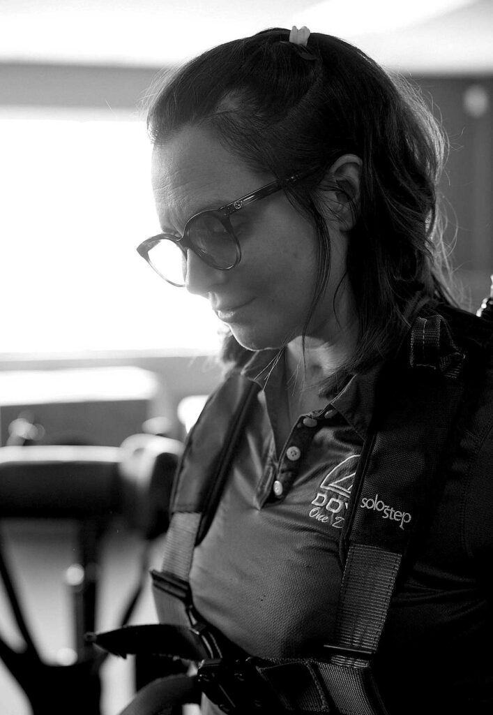 A bust of a woman in black and white