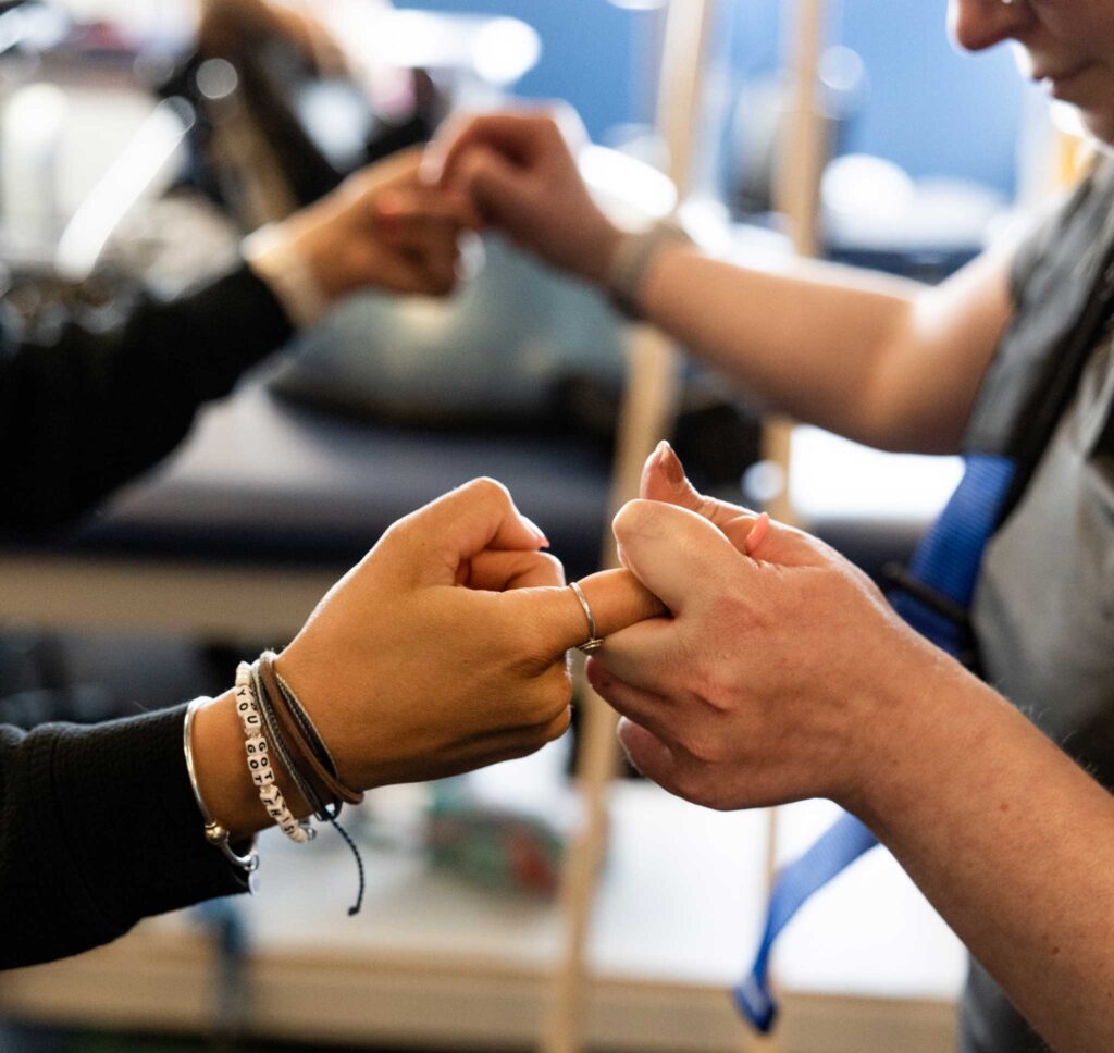 A close-up of holding hands