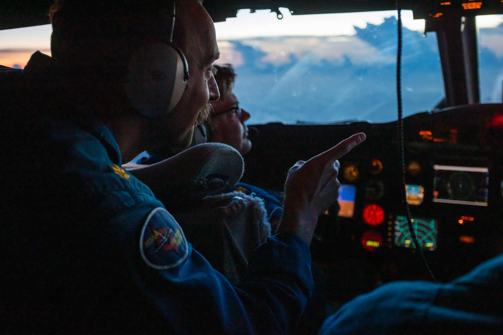Lt Cmdr Brett Copare and LCDR David Keith at controls-during flight to Hurricane Lee on NOAA WP 3D Orion-N43RF Miss-Piggy 090823. Credit Lt-Cmdr Utama NOAA Corps