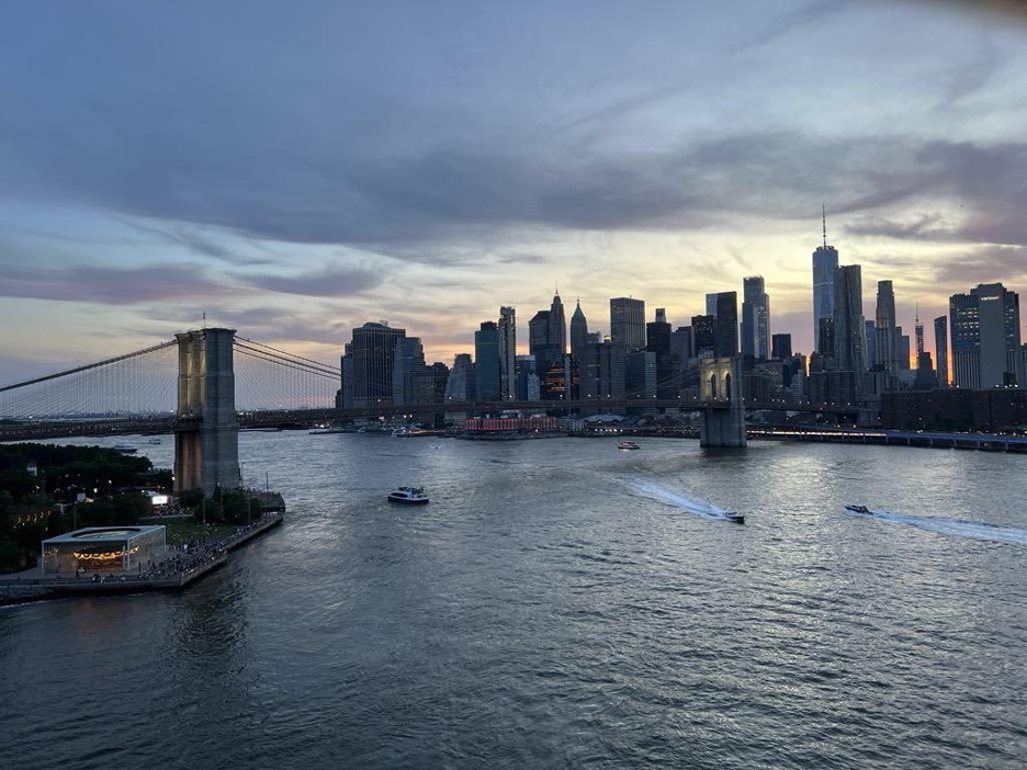 The ship struck the bridge before being swept beneath it, ultimately making landfall on the shore to the left. Photo by Hillary Mullan
