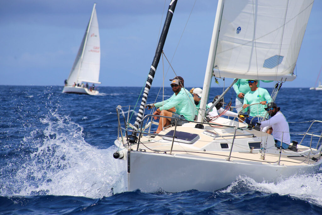 A boat kicking up spray