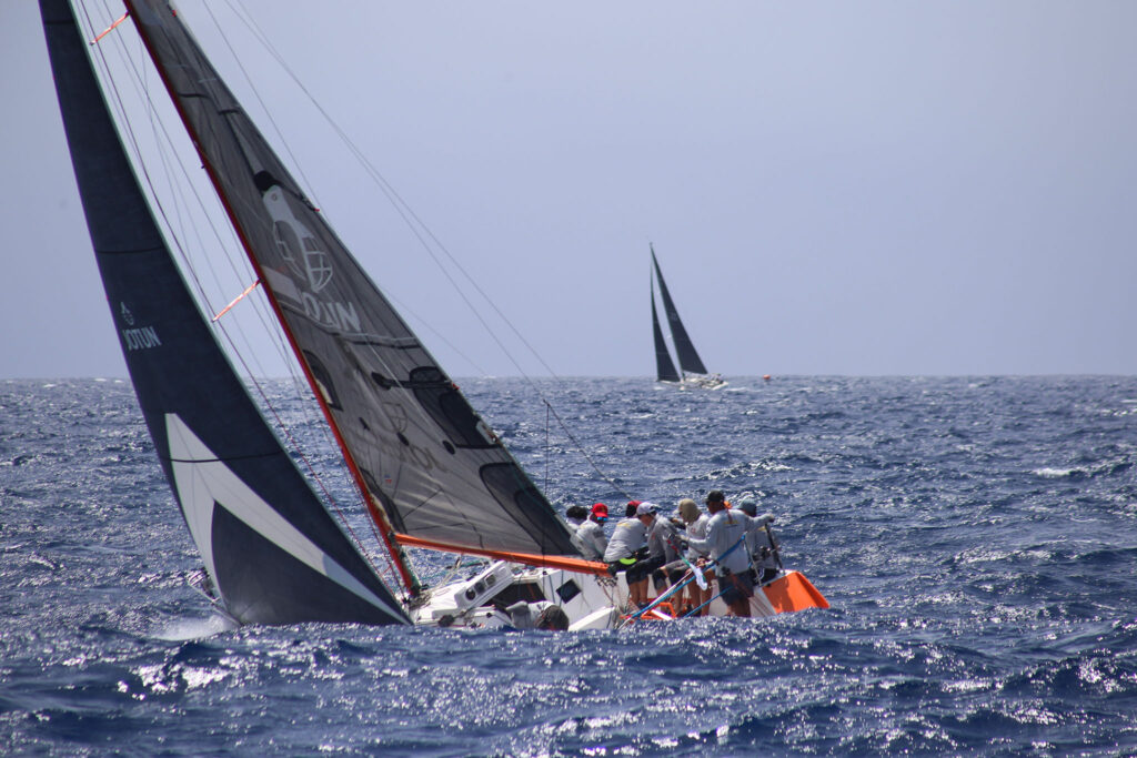 An orange boat and waves