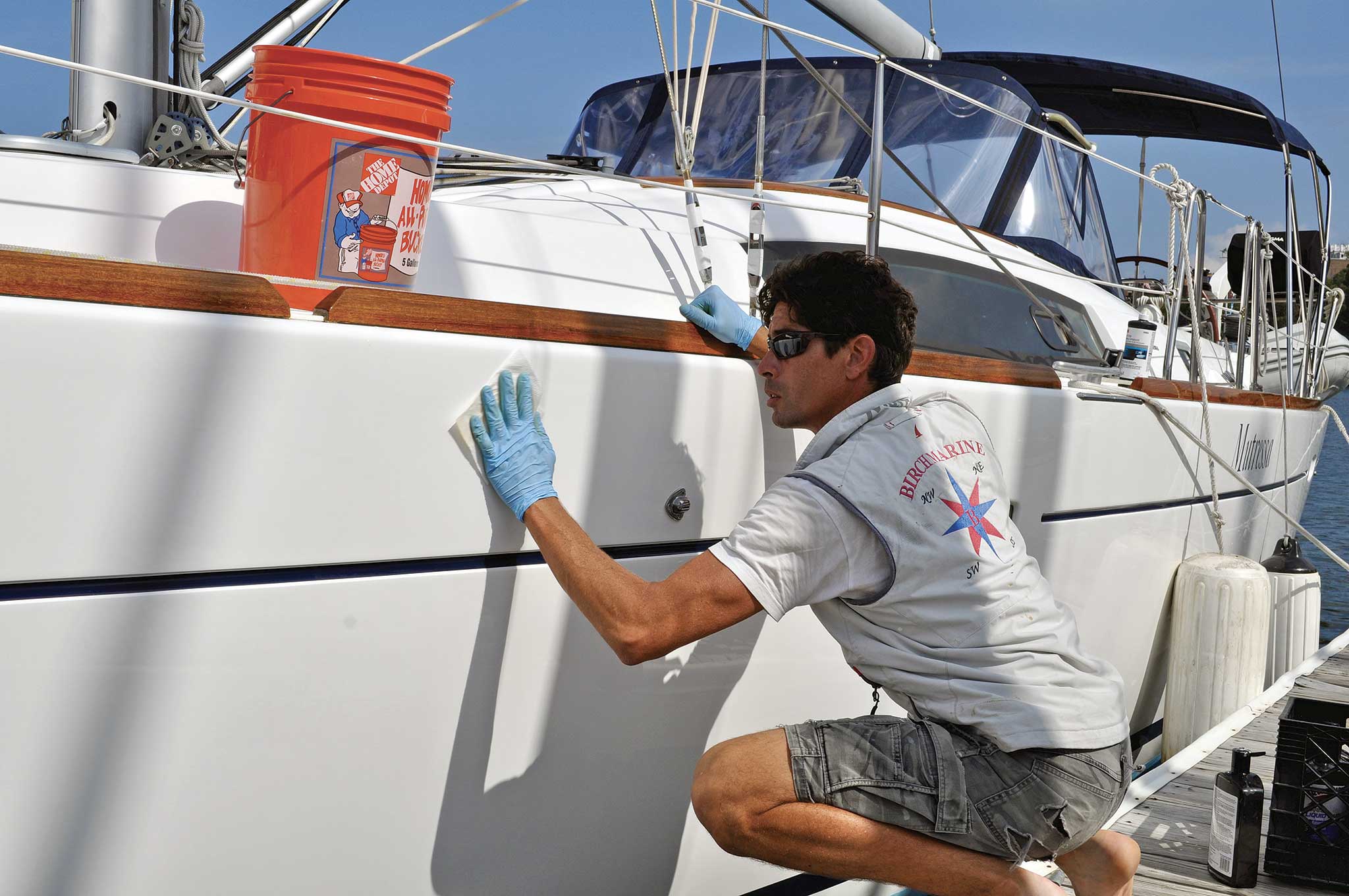 00-LEAD-DSC_0408-Summer Boat Care Checklist If your boat is in a slip, make sure both sides get equal treatment when washing. Photo by Christopher Birch
