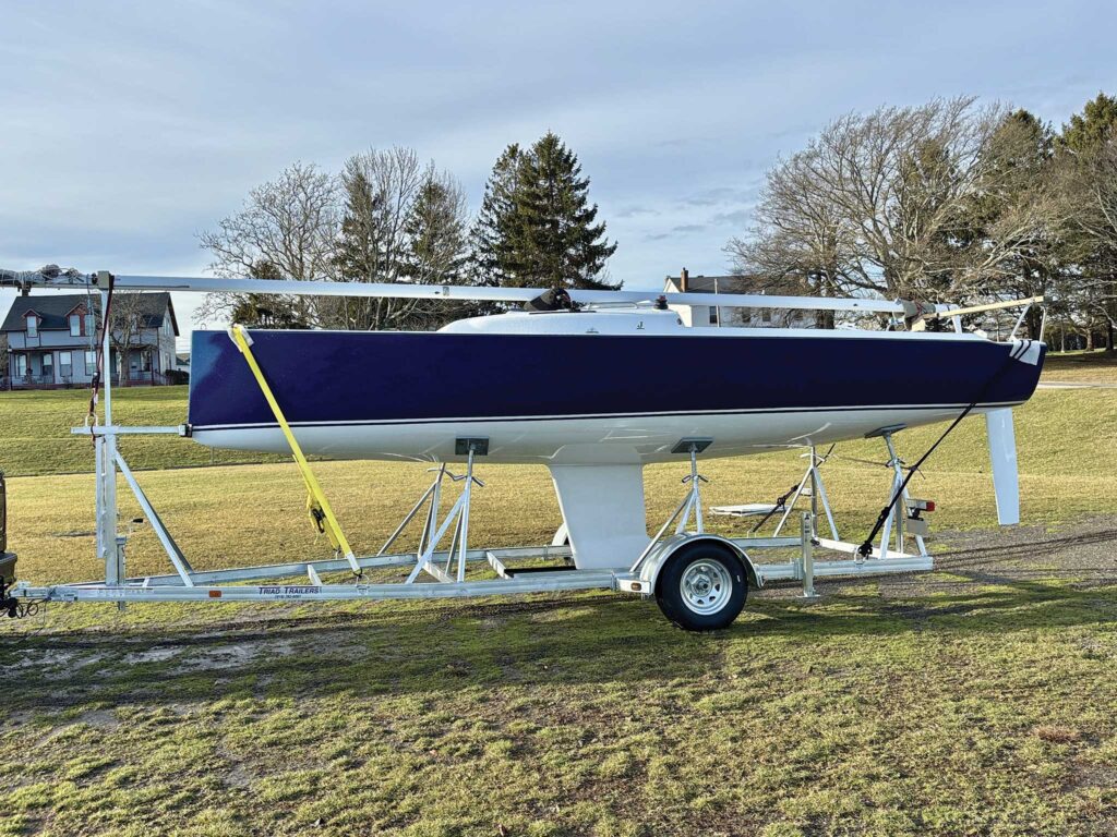 The J/7 is easily trailerable as shown in a backyard.