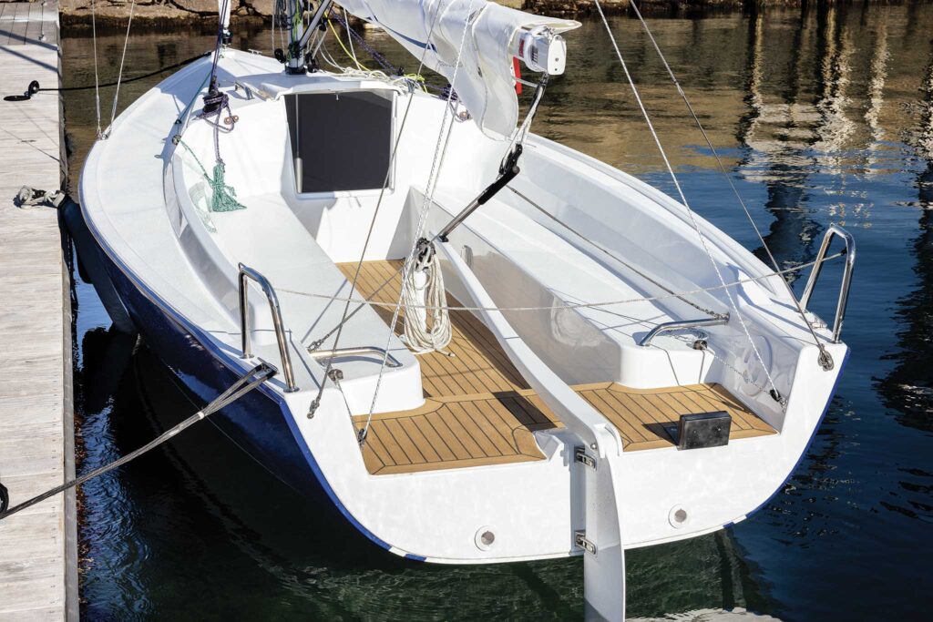 A view of the boat's cockpit layout as it sits in the water; simple and ergonomic