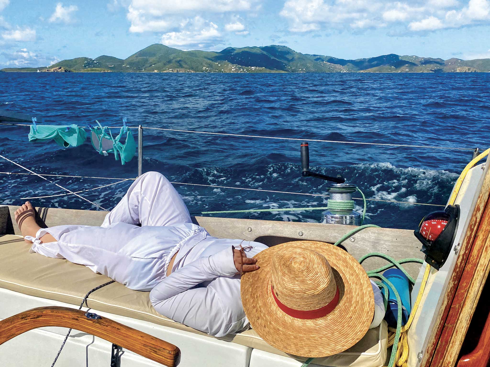 The author’s wife, Alison, taking a cockpit nap off of St. John, USVI. Right, sleep pressure and our circadian rhythm determine how sleepy we are. Photo by Adam Cove