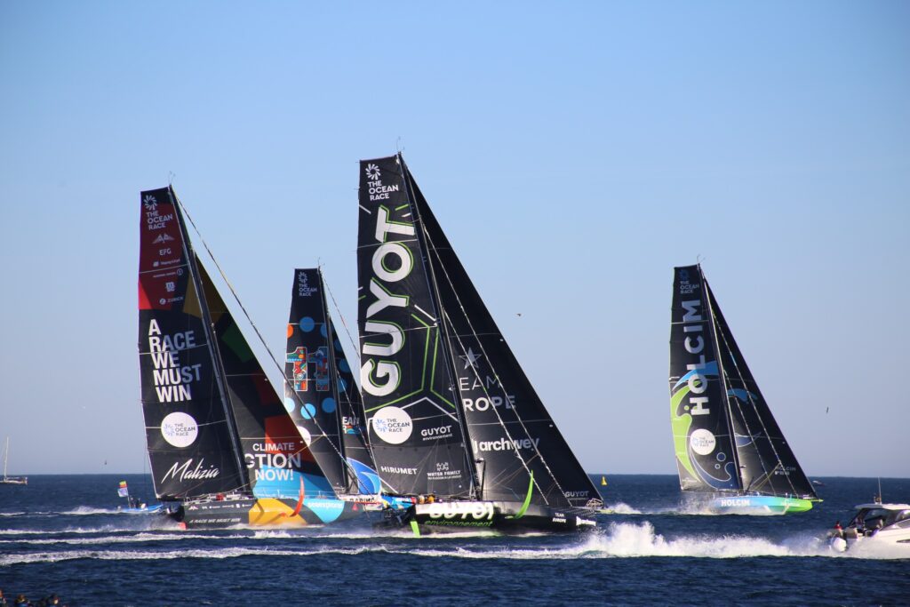 Boats with black sails racing