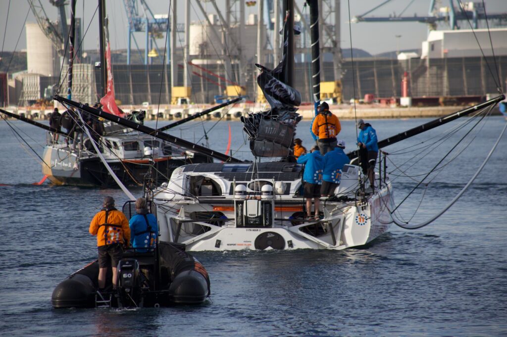 Boats in the water with people aboard