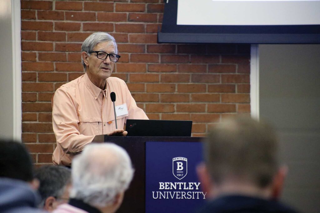Moderator Roy Greenwald introduces the 2025 symposium.