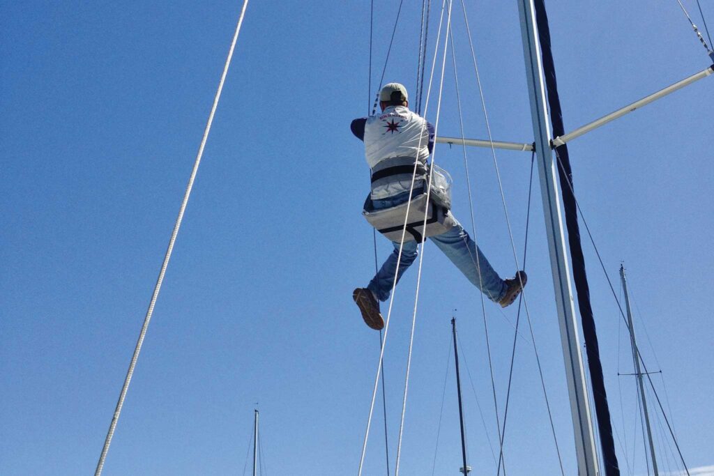 Person in the air above a boat