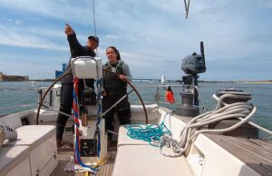 A man and a woman on a boat.