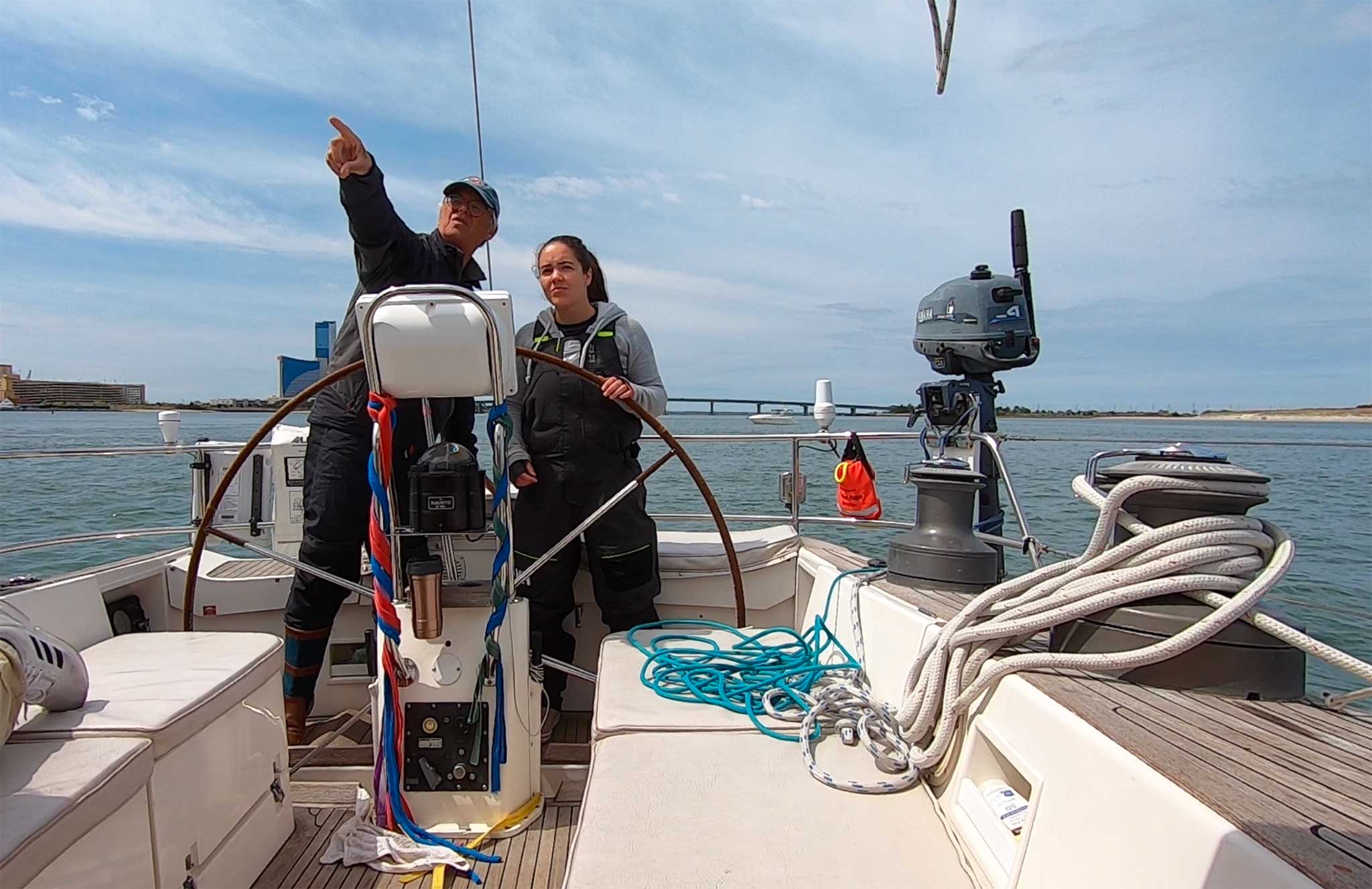 A man and a woman on a boat.
