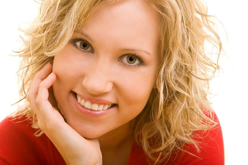 Section_image_lady_smiling_in_red