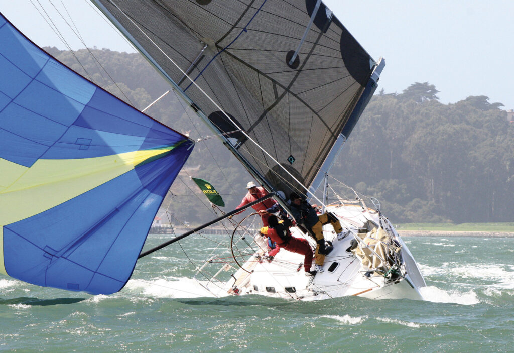 a sailboat with people on it