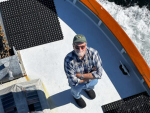 a man standing on a boat