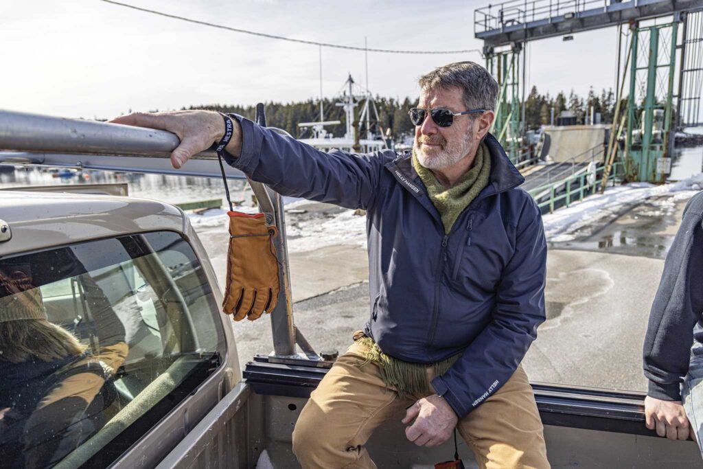 a man sitting on a truck