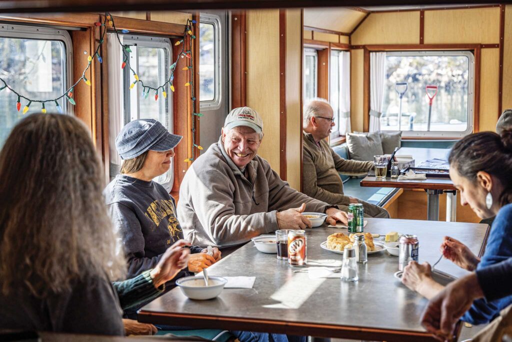 a group of people sitting at a table