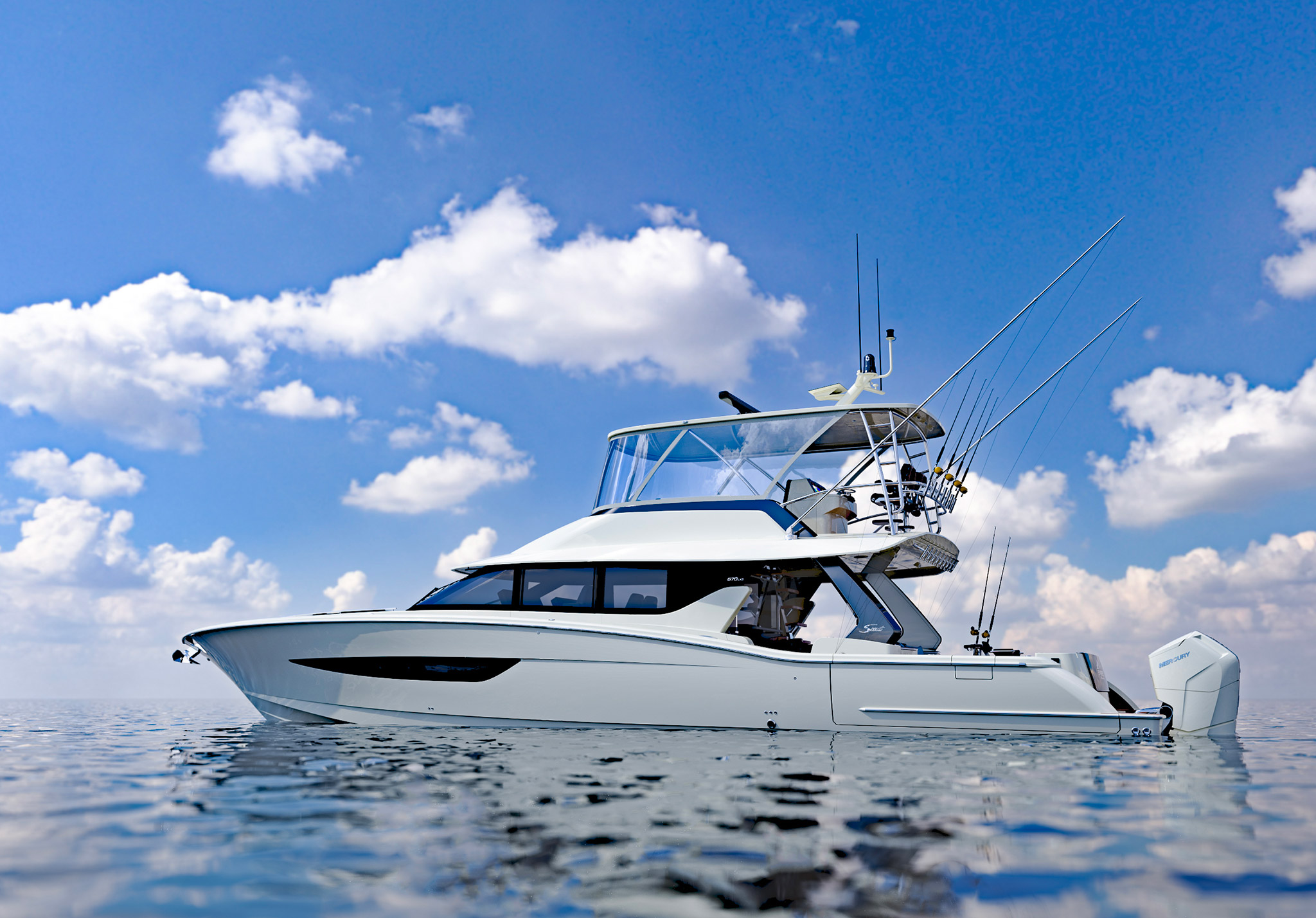 a white boat on water