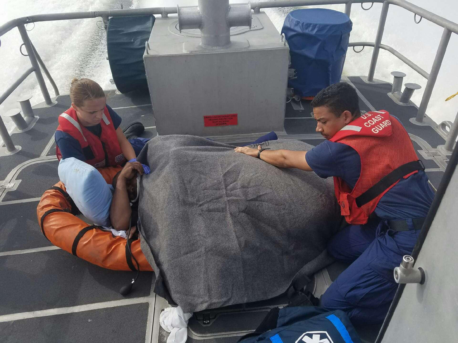 Coast Guard medevacs man from boat off Sabine Pass, Texas Seaman Martin Sissac and Petty Officer 3rd class Kaylee Harding tend to a man with a broken leg and arm during a medevac off Sabine Pass, Texas, Mar. 22, 2017. The man fell while underway on an offshore supply vessel, was taken to Coast Guard Station Sabine and transferred to EMS in stable condition. Photo by Coast Guard Station Sabine