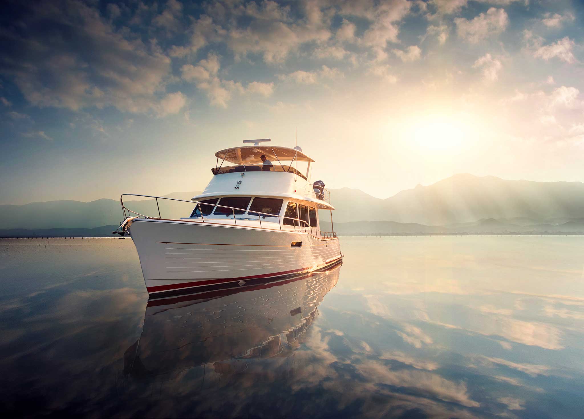 Boat on the water at sunrise