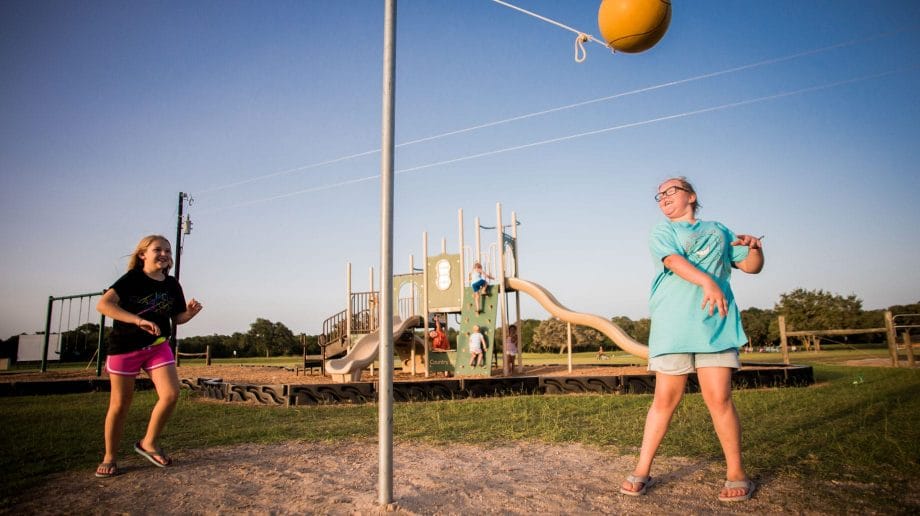 Girls playing tetherball