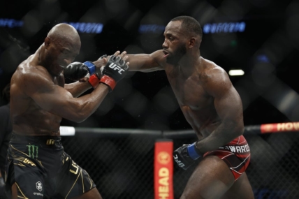 Aug 20, 2022; Salt Lake City, Utah, USA; Kamaru Usman (red gloves) fights Leon Edwards (blue gloves) during UFC 278 at Vivint Arena. Mandatory Credit: Jeffrey Swinger-USA TODAY Sports