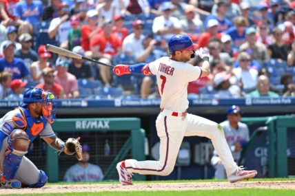 Jun 25, 2023; Philadelphia, Pennsylvania, USA; Philadelphia Phillies shortstop Trea Turner (7) hits an RBI single against the New York Mets during the third inning at Citizens Bank Park. Mandatory Credit: Eric Hartline-USA TODAY Sports