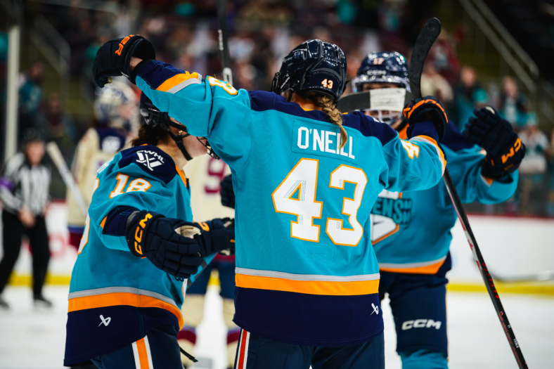 New York Sirens forward Kristin O'Neill celebrates with teammates during a game against her former squad, the Montreal Victoire.