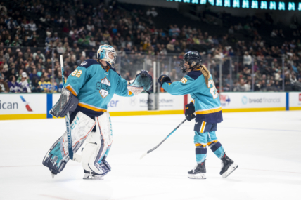 New York Sirens goalie Kayle Osborne and rookie forward Casey O'Brien fist bump after a comeback win over the Seattle Torrent.