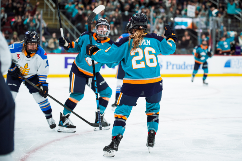 New York Sirens rookies Casey O'Brien and Kristyna Kaltounkova celebrate after a goal against the Toronto Sceptres.