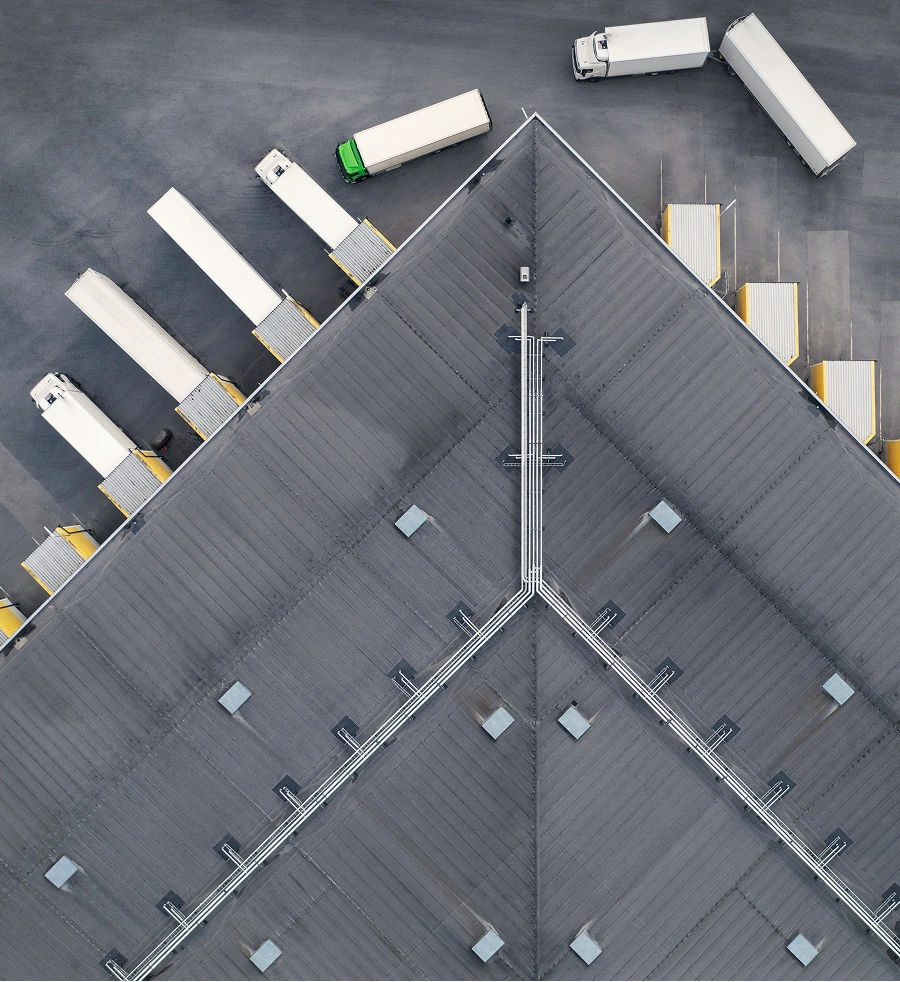 Aerial view of trucks parked at a freight shipping facility