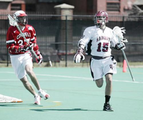 Junior attackman Mike McBride, shown in earlier action, had seven points, including five assists in the Harvard men’s lacrosse team’s 19-9 blowout of Holy Cross on Saturday. The Crusaders have never beaten the Crimson in 10 meetings.