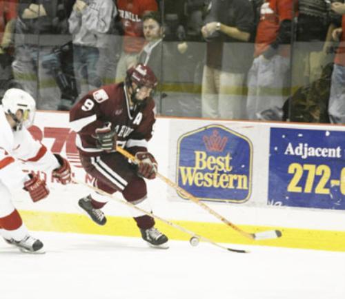 Center Tom Cavanagh, shown in earlier action, played a part in each of Harvard's five goals this weekend.